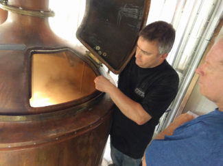 Brewmaster Sebastian showing us around Brasserie Deseveaux